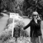 Jean in park sign